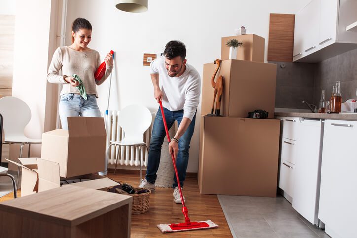 couple cleaning moving in or out